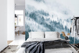 Forest mural wallpaper creating depth in modern living room with grey sofa and natural light