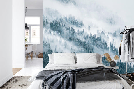 Forest mural wallpaper creating depth in modern living room with grey sofa and natural light