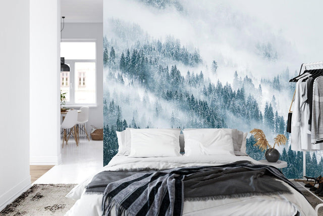 Forest mural wallpaper creating depth in modern living room with grey sofa and natural light