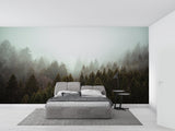 Forest landscape wallpaper creating depth in modern living room with grey sofa and natural light