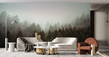 Misty pine forest mural in cozy bedroom setting with minimal furniture