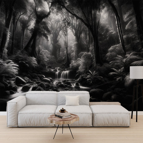 Black and white forest waterfall mural wallpaper creating depth in a modern living room with minimal furniture
