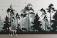 Forest silhouette wallpaper with deer creating a cozy atmosphere in a modern Scandinavian living room