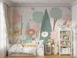 Forest garden wallpaper creating a magical atmosphere in a bright nursery with white furniture