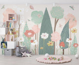 Pastel forest wallpaper with butterflies bringing nature into a child's reading nook
