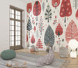 Scandinavian forest wallpaper in modern living room, red and black tree pattern creating cozy atmosphere