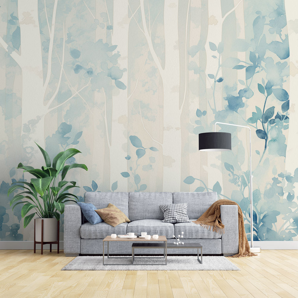 Blue forest wallpaper mural creating a peaceful atmosphere in a modern living room with white furniture