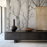 Winter forest wall mural brightening a cozy bedroom with soft grey tones