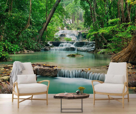 Tropical waterfall wallpaper creating a stunning focal point in a modern living room with white furniture
