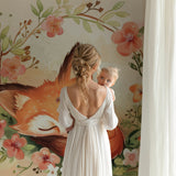 Fox and floral mural creating a dreamy atmosphere in a playroom setting