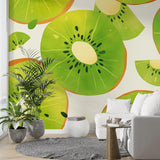 Fresh Kiwi Pattern Wallpaper bringing life to a modern kitchen space with white cabinets and natural lighting