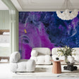 Galaxy wallpaper mural creating a magical atmosphere in a modern bedroom with minimal furniture