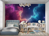 Space themed gaming room featuring pink and blue galaxy wallpaper mural