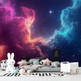 Teen bedroom with cosmic nebula wall mural in soothing pink and blue tones