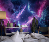Galaxy wallpaper mural in modern bedroom showing purple and blue cosmic swirls creating dreamy atmosphere