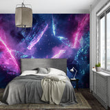 Gaming room featuring purple galaxy wall mural creating immersive space atmosphere