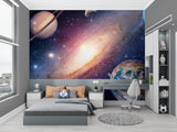 Galaxy mural in reading nook with cozy space theme setup
