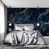 Blue and gold galaxy wallpaper creating luxury atmosphere in dining room