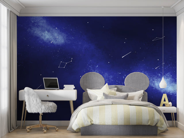 Galaxy wallpaper creating a dreamy atmosphere in a modern bedroom with ambient lighting