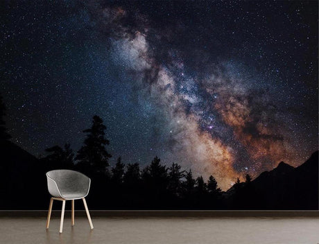 Galaxy wallpaper mural transforms this modern bedroom into a stargazing paradise