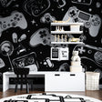 Gaming controller wallpaper in modern teen bedroom, black and white design creating cool gaming atmosphere