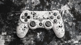 PlayStation controller wallpaper design file showing detailed monochrome pattern