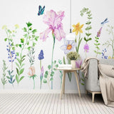 Watercolor butterfly wallpaper bringing charm to a little girl's bedroom with soft pastel decor