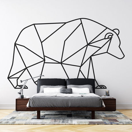 Geometric bear line art wallpaper displayed in a minimalist Scandinavian living room, showing clean black lines on white background