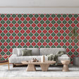Geometric leaf wallpaper bringing Art Deco style to a modern dining room with red and green accents
