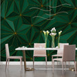 Green and gold geometric wallpaper creating depth in a modern living room with minimal furniture