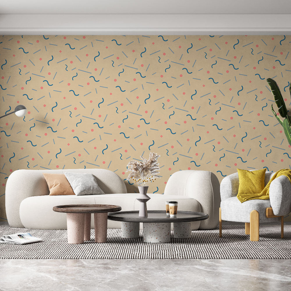 Geometric pattern wallpaper with blue lines and coral dots bringing modern style to a bright living room setting