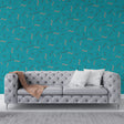 Modern geometric pattern wallpaper creating a bold statement wall in a bright contemporary living room
