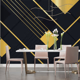 Black and gold geometric pattern adding sophistication to master bedroom wall