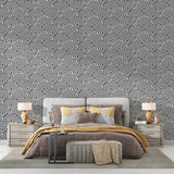 Black and white geometric wall mural in minimalist office space highlighting clean lines