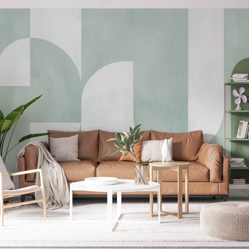 Geometric Art Deco wallpaper with sage green circles creating a peaceful atmosphere in a modern living room setting