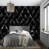 Hallway with modern black 3D geometric wallpaper creating visual interest