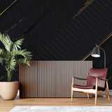Black and gold geometric wallpaper in dining room makes bold statement