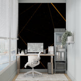 Geometric linear pattern wallpaper creating depth in a sleek home office with desk and chair