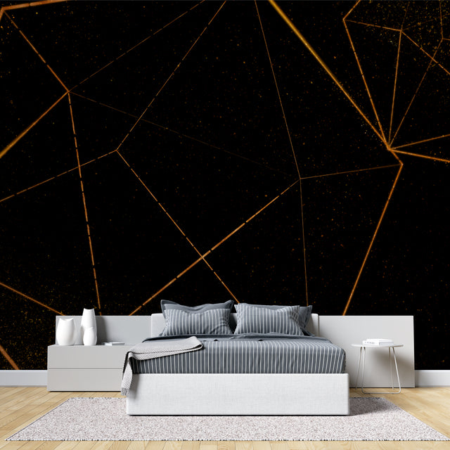 Geometric black and gold wallpaper in modern living room creating dramatic accent wall