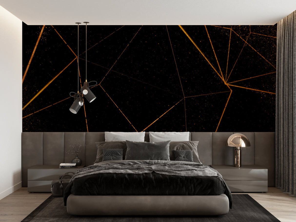 Black and gold geometric wallpaper in modern living room with tall windows and grey sofa