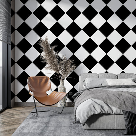 Black and white geometric diamond wallpaper in a modern living room creating a stunning focal wall