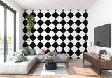 Diamond pattern wallpaper adding depth to a minimalist home office space