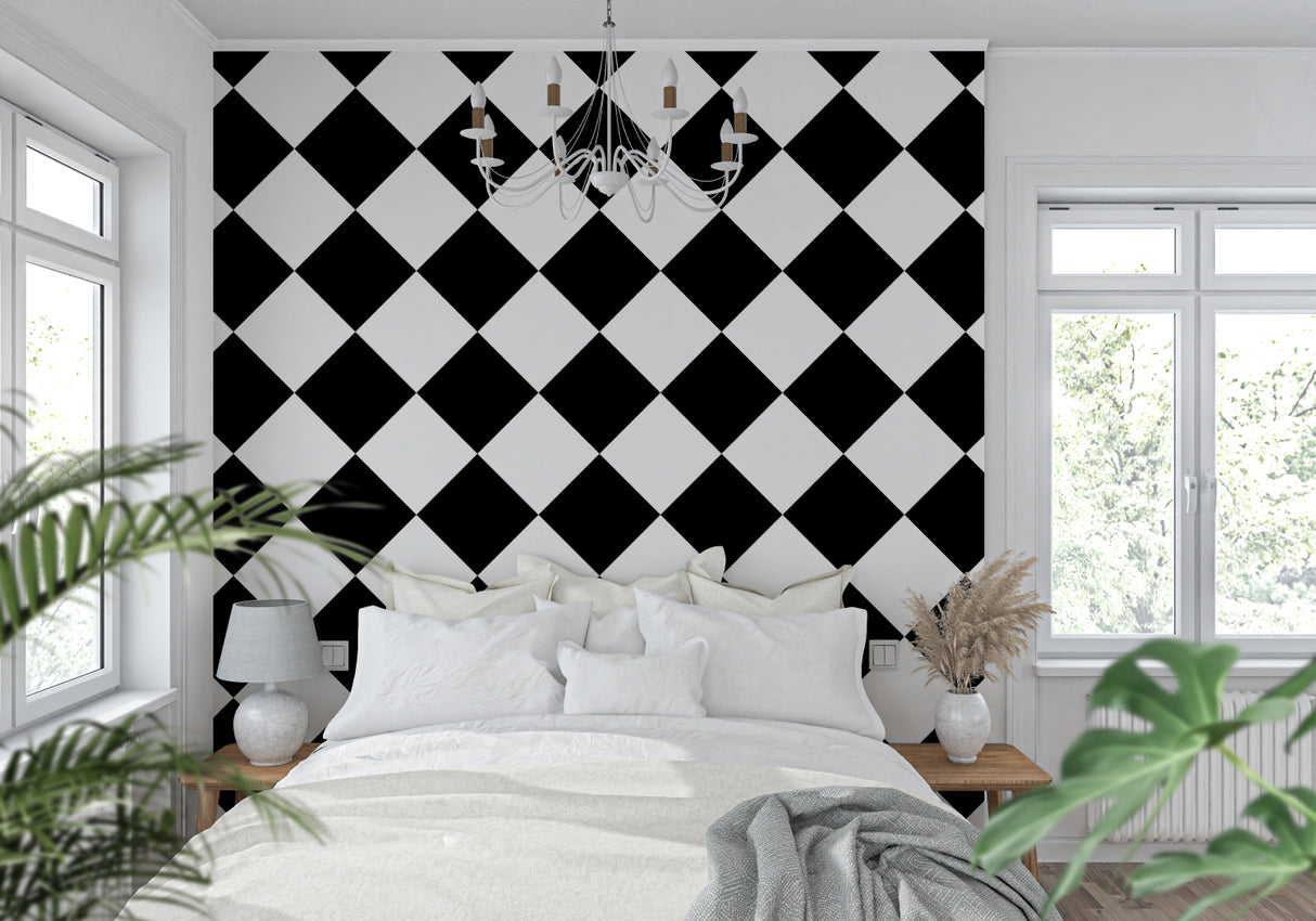 Geometric black and white wallpaper making a bold statement in a dining room