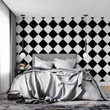 Modern diamond pattern mural creating visual interest in a bedroom