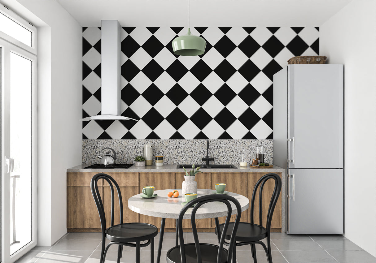 Black and white geometric wallpaper adding sophistication to an entrance hall