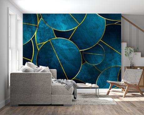 Blue and gold geometric wallpaper creating a sophisticated atmosphere in a modern living room