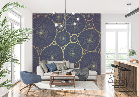 Modern geometric wallpaper with blue and gold circles creating depth in a minimalist living room