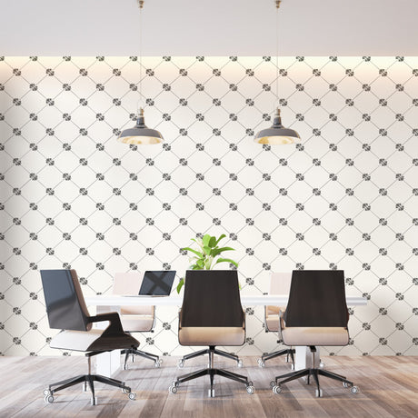 Geometric diamond wallpaper in modern living room showing black and white pattern creating depth
