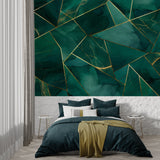 Modern geometric wallpaper featuring green and gold pattern in master bedroom setting