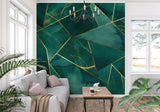 Metallic gold geometric pattern on emerald green background in hallway setting